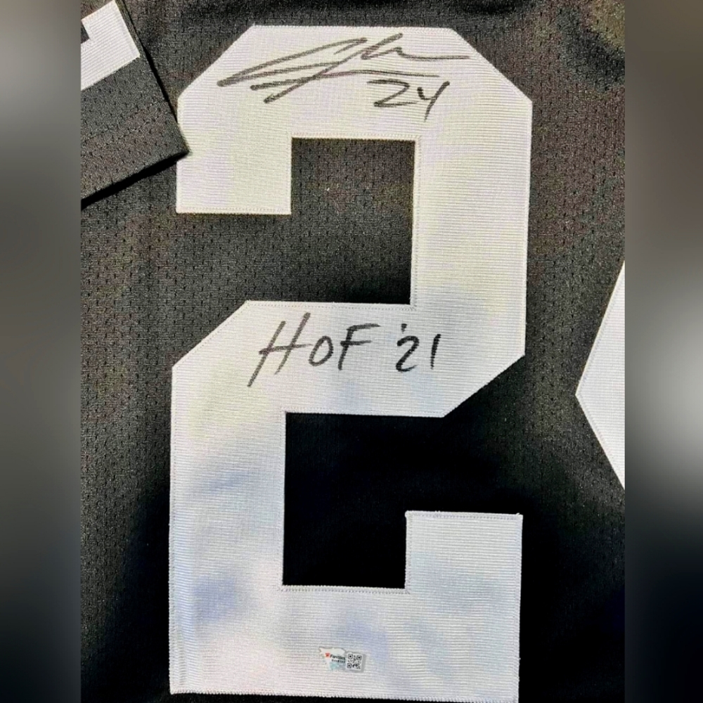 Charles Woodson signed Mitchell & Ness jersey
